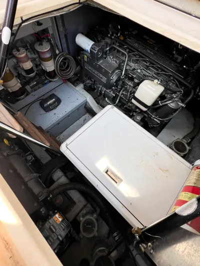 A'maure Yacht Photos Pics Engine compartment of a 2001 Apreamare 11 boat, showcasing mechanical components and systems.