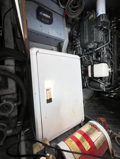 A'maure Yacht Photos Pics Engine room of a 2001 Apreamare 11 boat, featuring mechanical components and storage.