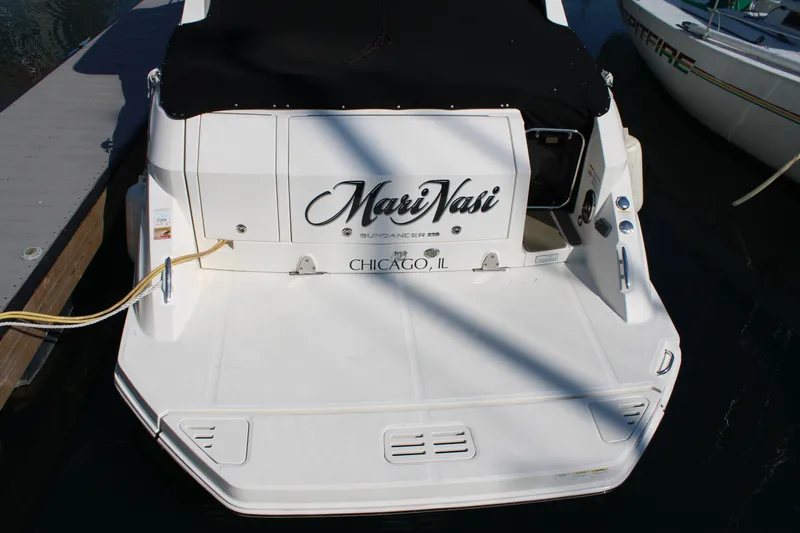  Yacht Photos Pics 2019 Sea Ray Sundancer 320 docked, rear view with "MariNasi" and "Chicago, IL" text.