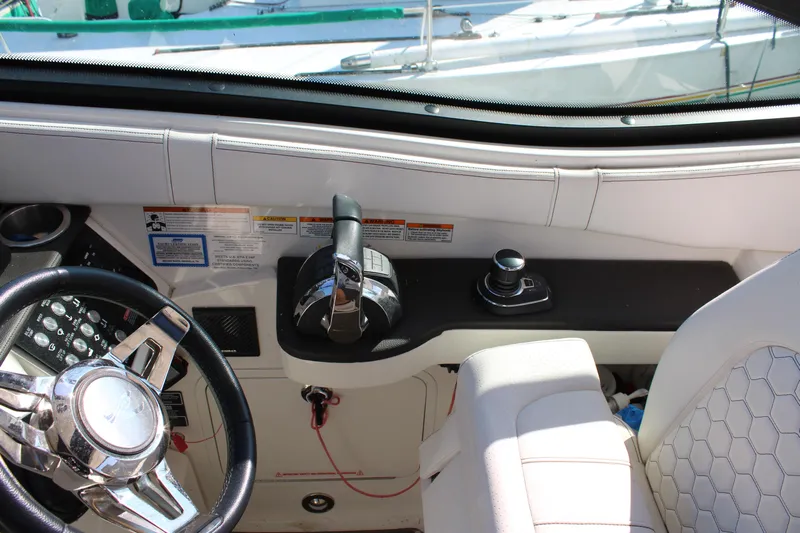  Yacht Photos Pics 2019 Sea Ray Sundancer 320 helm with steering wheel and throttle controls.