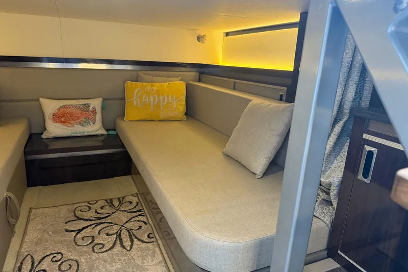  Yacht Photos Pics Interior of 2019 Sea Ray Sundancer 320 with cozy seating and decorative pillows.