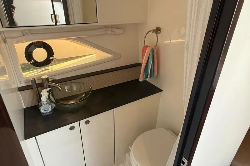  Yacht Photos Pics Bathroom interior of 2019 Sea Ray Sundancer 320 yacht with modern fixtures.