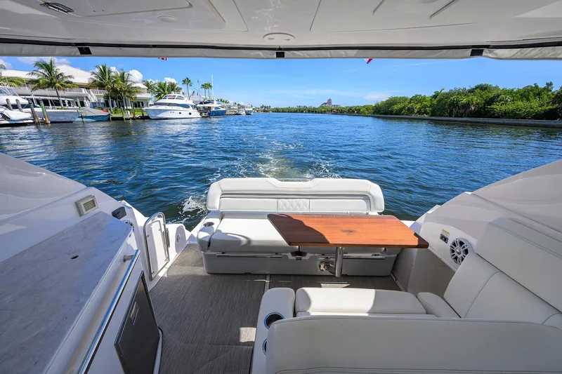 Damn Daddy Yacht Photos Pics 2020 Regal 35 Sport Coupe yacht interior with scenic waterway view.