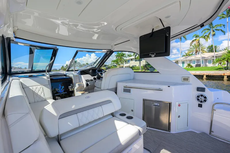 Damn Daddy Yacht Photos Pics 2020 Regal 35 Sport Coupe interior with luxurious seating and modern amenities.