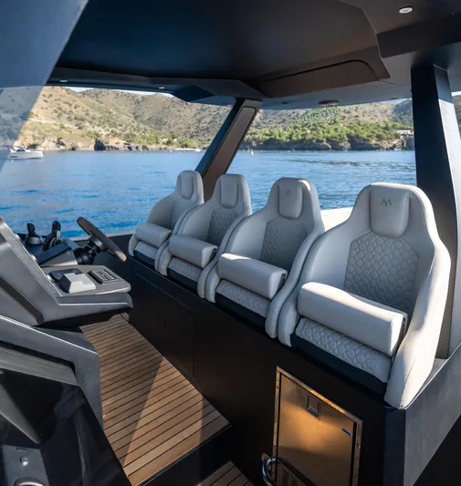 Stock Yacht Photos Pics Luxury interior of 2025 Maxim Yachts 43 Comfort, featuring sleek seating and modern design.