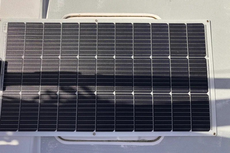 Orion Yacht Photos Pics Solar panel on a 2002 Hunter 410 boat deck, capturing sunlight efficiently.