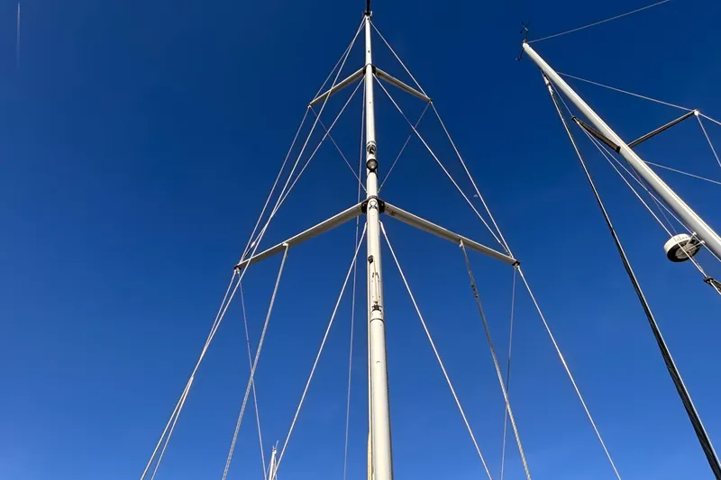 Orion Yacht Photos Pics Sailboat mast against clear blue sky, Hunter 410, 2002 model.