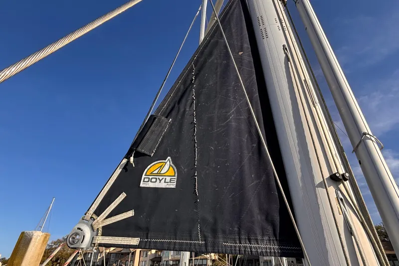 Orion Yacht Photos Pics Sailboat mast and sail with Doyle logo, Hunter 410 model, 2002.