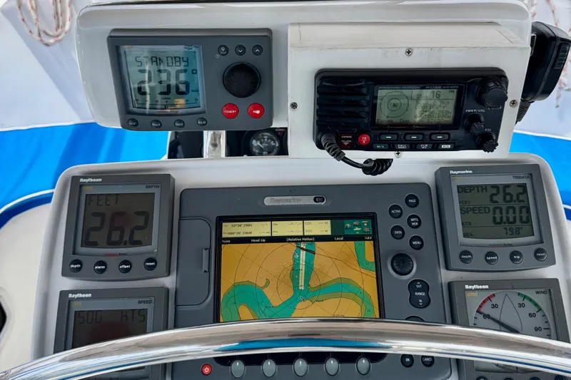 Orion Yacht Photos Pics Boat navigation dashboard with electronic displays and controls, Hunter 410, 2002 model.