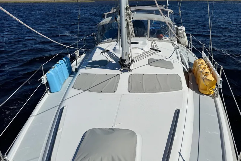 Orion Yacht Photos Pics Sailing yacht Hunter 410, 2002 model, on calm blue waters.