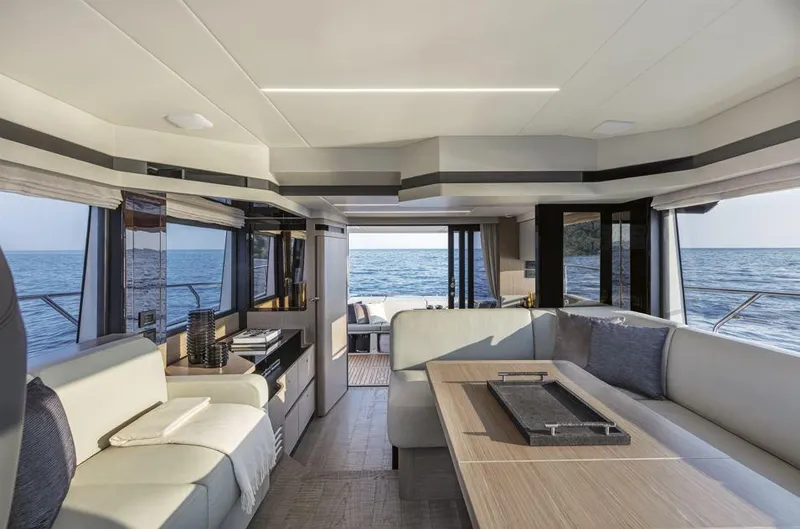 Absolute 50 Fly Yacht Photos Pics Luxurious interior of 2025 Absolute 50 Fly yacht with ocean view.