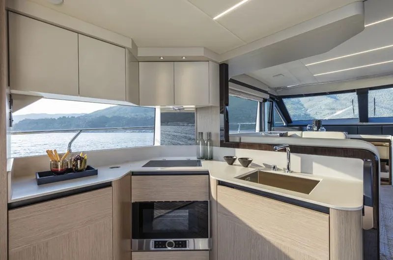 Absolute 50 Fly Yacht Photos Pics Luxurious kitchen interior of 2025 Absolute 50 Fly yacht with modern amenities and scenic views.