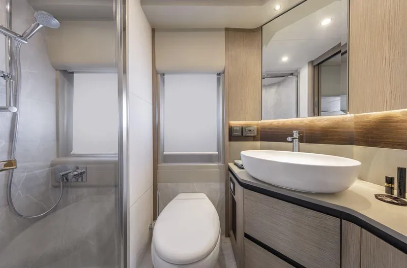 Absolute 50 Fly Yacht Photos Pics Luxurious bathroom in 2025 Absolute 50 Fly yacht, featuring modern fixtures and elegant design.