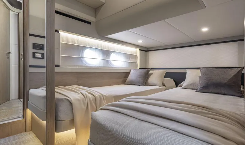 Absolute 50 Fly Yacht Photos Pics Luxurious twin bedroom in 2025 Absolute 50 Fly yacht, featuring modern design and ambient lighting.