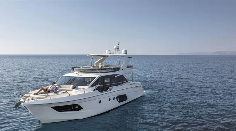 Absolute 50 Fly Yacht Photos Pics Luxury Absolute 50 Fly yacht cruising on open sea, 2025 model.