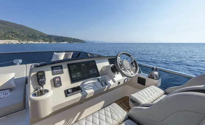 Absolute 50 Fly Yacht Photos Pics Flybridge of 2025 Absolute 50 Fly yacht with modern controls and ocean view.