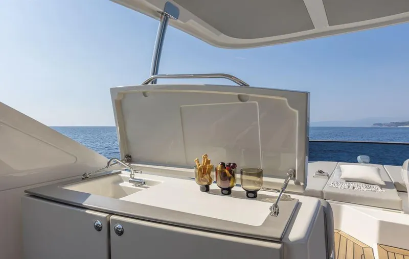 Absolute 50 Fly Yacht Photos Pics Luxury yacht Absolute 50 Fly 2025 with outdoor sink and ocean view.