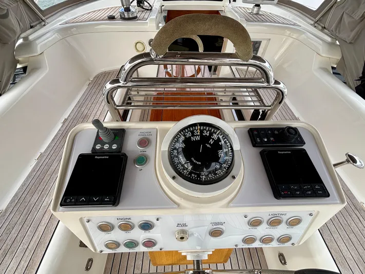  Yacht Photos Pics Cockpit of 2003 Oyster 56 yacht with navigation instruments and compass.