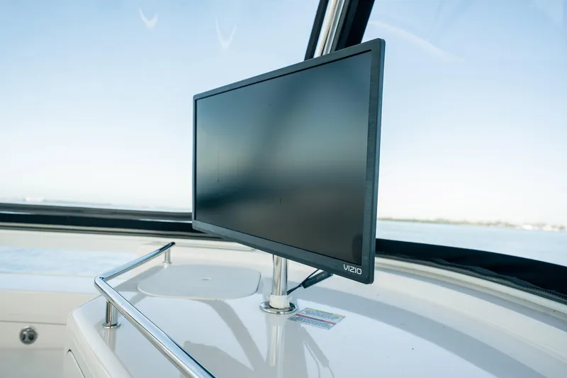 Love & Luck II Yacht Photos Pics Vizio monitor on 2007 Sea Ray 580 Sedan Bridge yacht, overlooking ocean view.