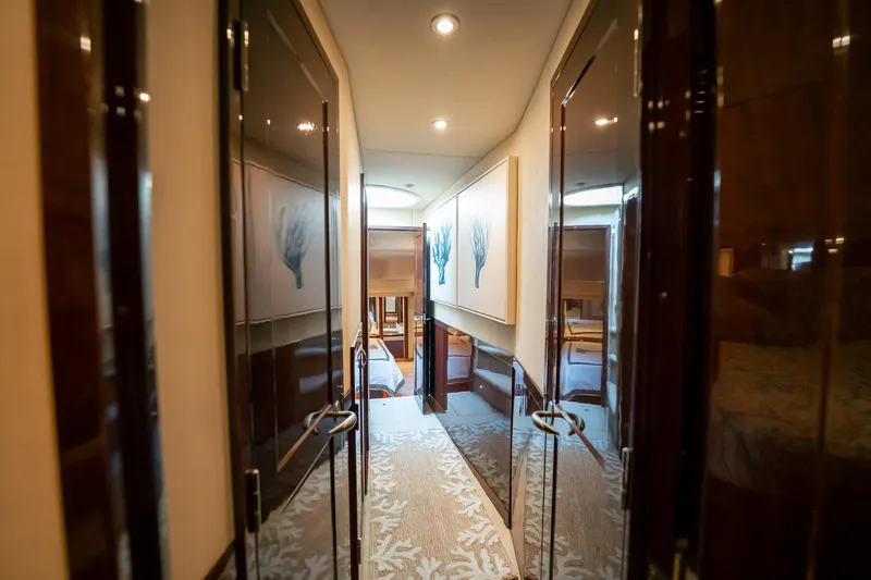 Love & Luck II Yacht Photos Pics Luxurious hallway inside 2007 Sea Ray 580 Sedan Bridge yacht, featuring elegant wood finishes.