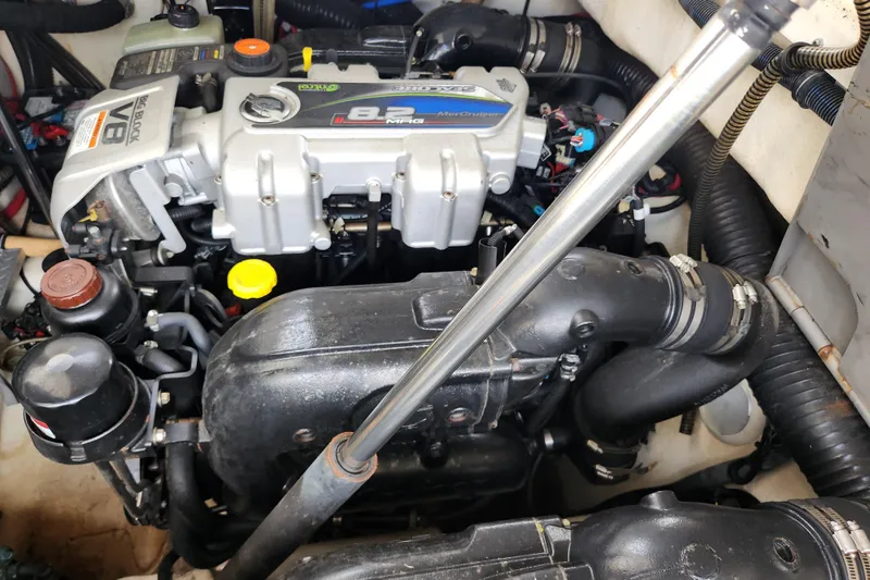 Let Me Liv! Yacht Photos Pics Engine compartment of a 2015 Formula 34 Performance Cruiser, featuring a MerCruiser V8 engine.
