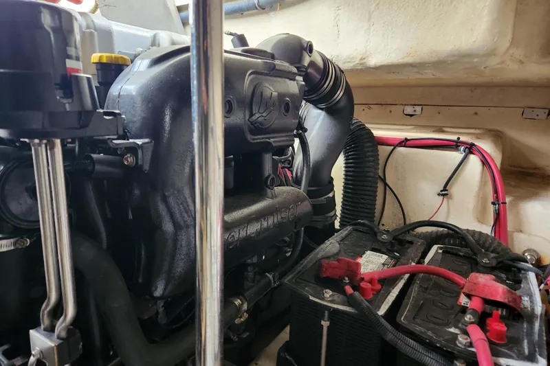 Let Me Liv! Yacht Photos Pics Engine compartment of a 2015 Formula 34 Performance Cruiser with visible battery and wiring.
