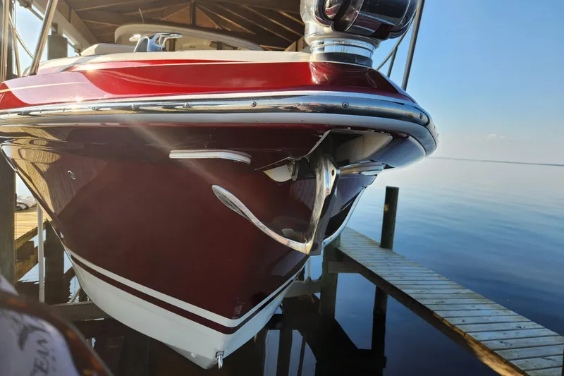 Let Me Liv! Yacht Photos Pics 2015 Formula 34 Performance Cruiser docked, showcasing sleek red and white hull design.