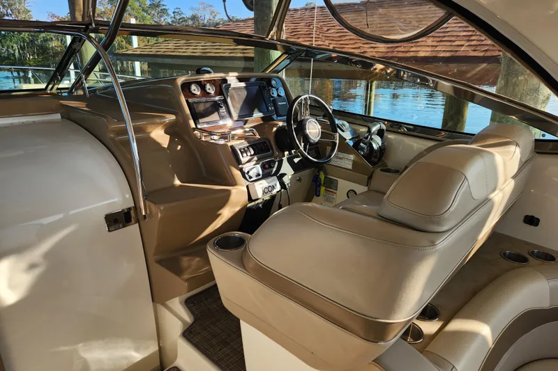 Let Me Liv! Yacht Photos Pics 2015 Formula 34 Performance Cruiser cockpit with luxurious seating and modern controls.