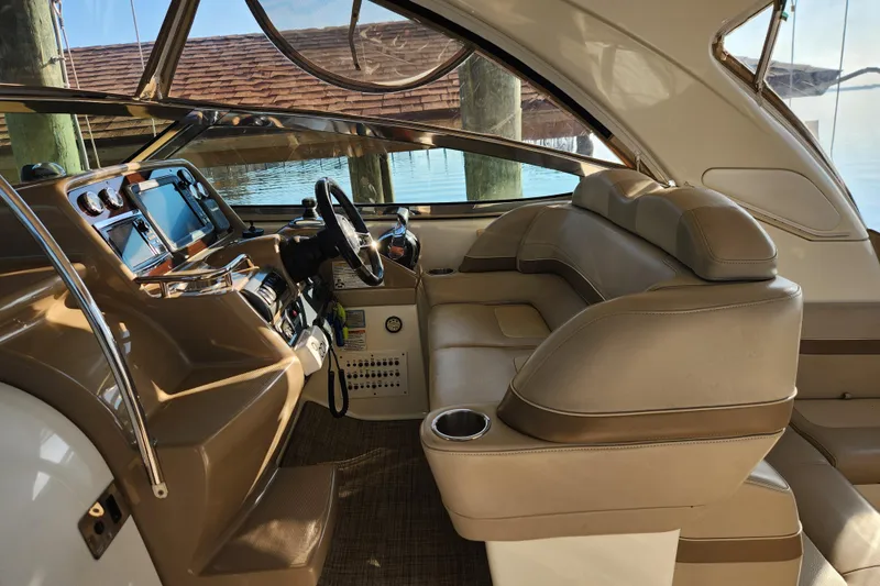 Let Me Liv! Yacht Photos Pics 2015 Formula 34 Performance Cruiser interior with leather seating and modern dashboard.
