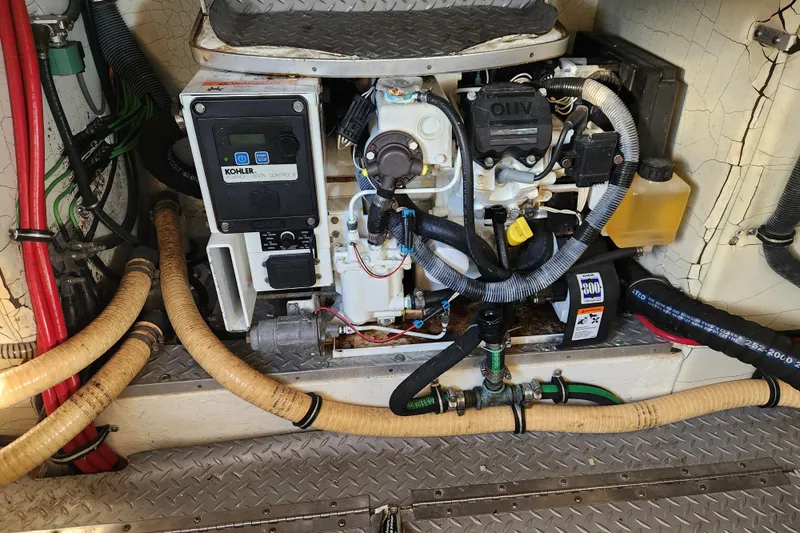 Let Me Liv! Yacht Photos Pics Engine compartment of a 2015 Formula 34 Performance Cruiser with Kohler generator.