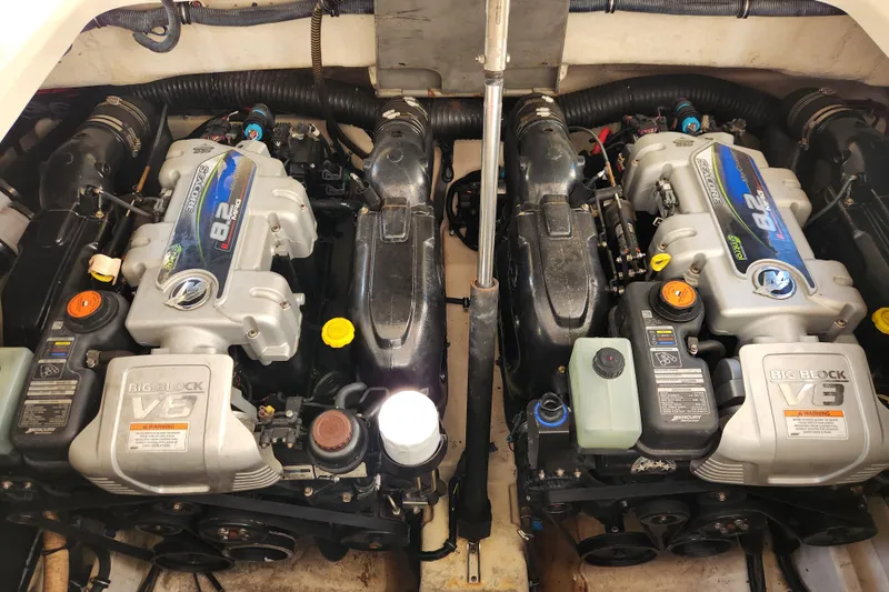 Let Me Liv! Yacht Photos Pics Twin engines of a 2015 Formula 34 Performance Cruiser, showcasing powerful V8 design.