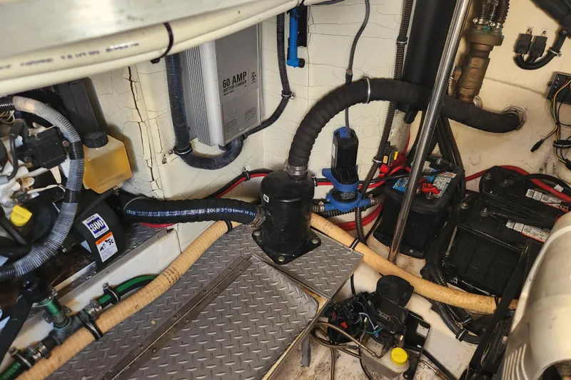 Let Me Liv! Yacht Photos Pics 2015 Formula 34 Performance Cruiser engine room with battery charger and wiring.