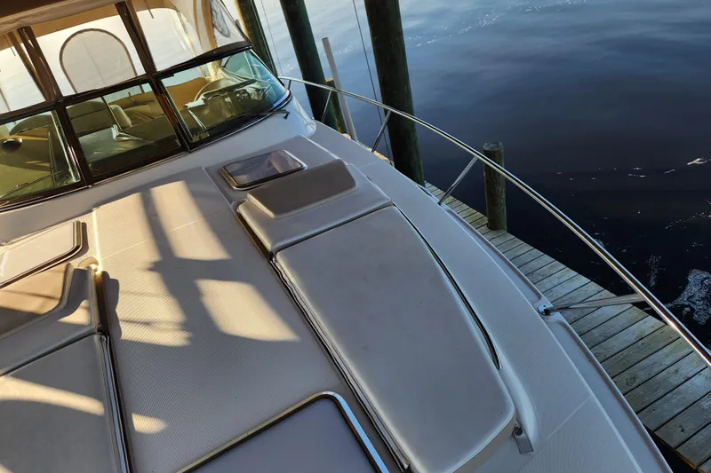 Let Me Liv! Yacht Photos Pics 2015 Formula 34 Performance Cruiser docked, showcasing sleek deck design and luxurious seating.
