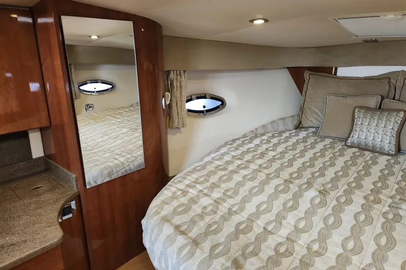 Let Me Liv! Yacht Photos Pics 2015 Formula 34 Performance Cruiser interior with bed, mirror, and porthole window.