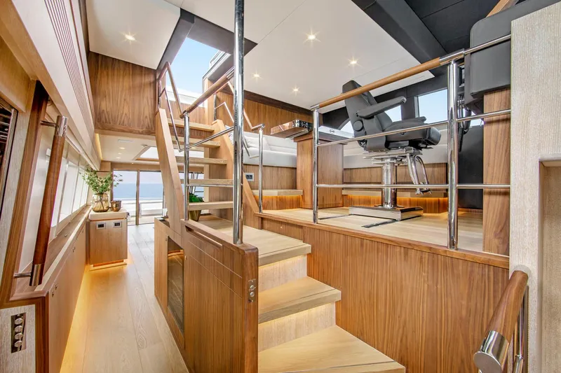 Helga Yacht Photos Pics Luxurious 2021 Van der Valk RAISED PILOTHOUSE interior with modern wood finishes and sleek design.