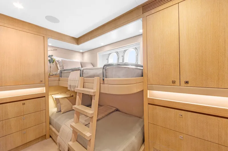 Helga Yacht Photos Pics Luxurious 2021 Van der Valk RAISED PILOTHOUSE yacht cabin with bunk beds and wooden interior.