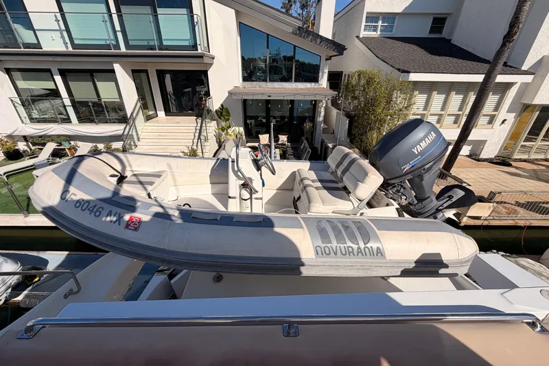 Le Reve Yacht Photos Pics 1999 Carver 530 Voyager Pilothouse with Novurania tender and Yamaha outboard motor.