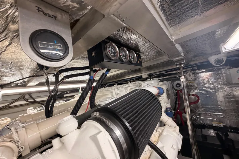 Le Reve Yacht Photos Pics Engine room of 1999 Carver 530 Voyager Pilothouse with gauges and wiring.