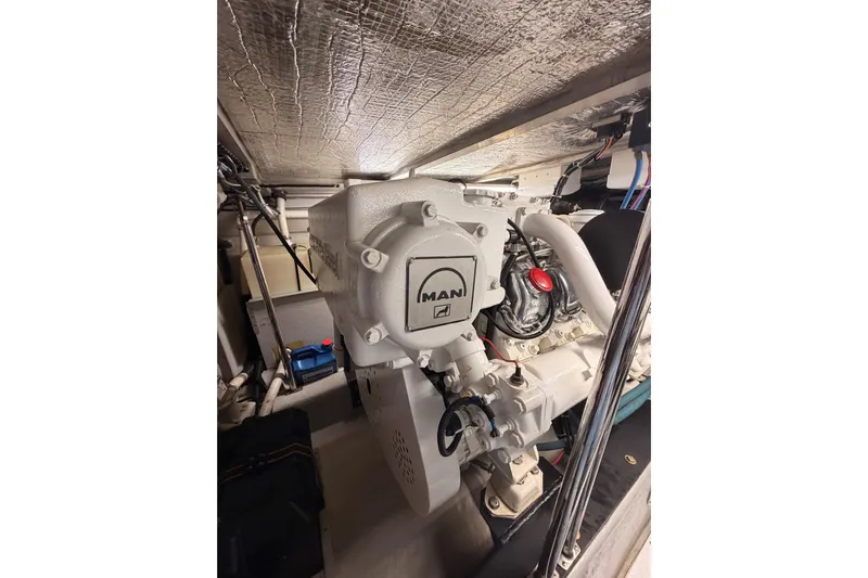 Le Reve Yacht Photos Pics Engine room of 1999 Carver 530 Voyager Pilothouse with MAN engine components.