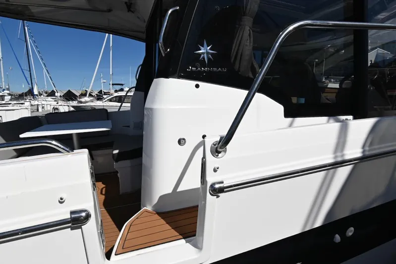 Shantytown Yacht Photos Pics 2020 Jeanneau NC 895 boat with sleek design and modern interior at a marina.