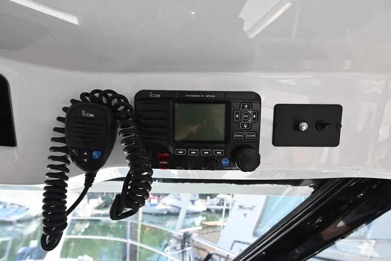 Shantytown Yacht Photos Pics VHF marine radio on 2020 Jeanneau NC 895 boat dashboard.