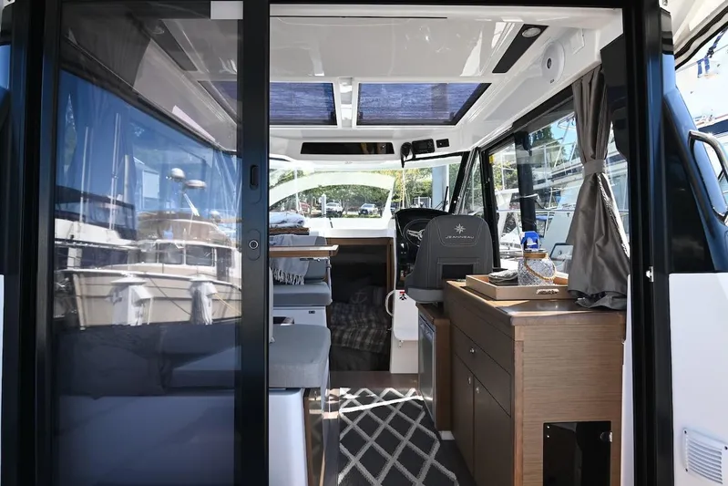 Shantytown Yacht Photos Pics Interior view of 2020 Jeanneau NC 895 boat, featuring modern design and comfortable seating.