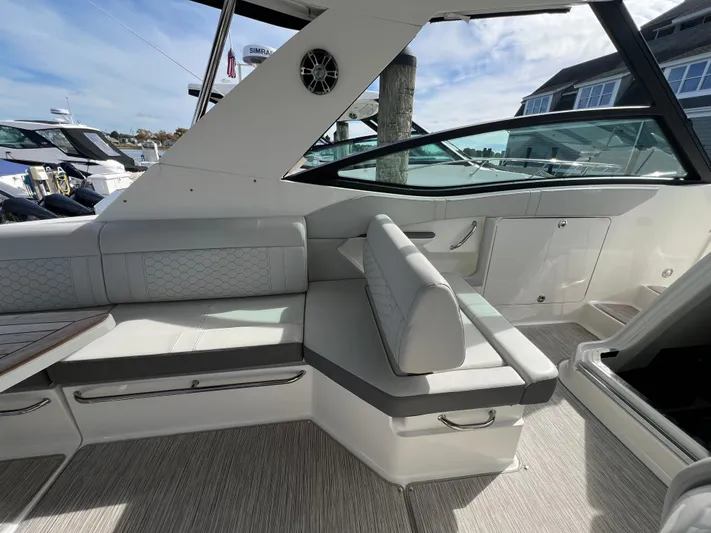 Touch Of Grey Yacht Photos Pics 2022 Sea Ray Sundancer 320 OB interior with sleek seating and modern design.