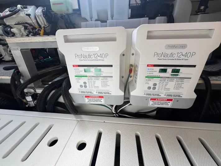 Touch Of Grey Yacht Photos Pics ProNautic 12-40P chargers in 2022 Sea Ray Sundancer 320 OB engine room.