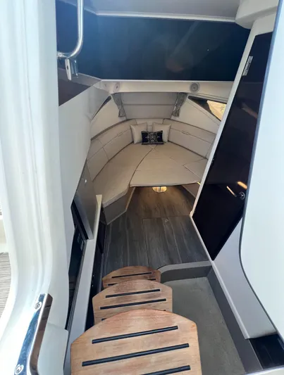 Touch Of Grey Yacht Photos Pics Interior cabin of 2022 Sea Ray Sundancer 320 OB, featuring modern design and comfortable seating.