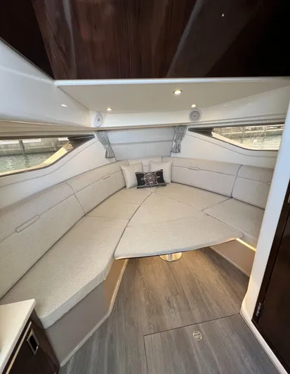 Touch Of Grey Yacht Photos Pics Luxurious interior of 2022 Sea Ray Sundancer 320 OB with elegant seating and modern design.