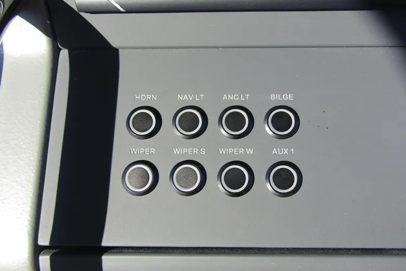  Yacht Photos Pics Control panel of a 2025 Nimbus Tender 9 boat with labeled buttons.