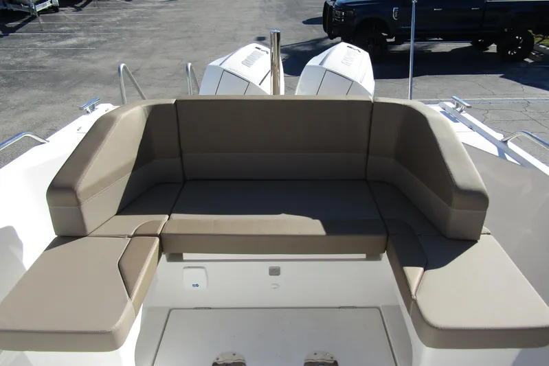  Yacht Photos Pics Luxurious seating on 2025 Nimbus Tender 9 boat, featuring comfortable cushions and sleek design.