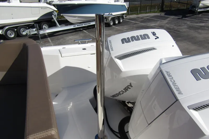  Yacht Photos Pics Nimbus Tender 9 boat with Mercury V6 engines, 2025 model, in a parking lot.
