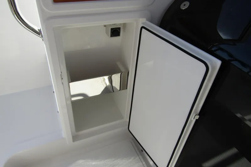  Yacht Photos Pics Open storage compartment on a 2025 Nimbus Tender 9 boat.